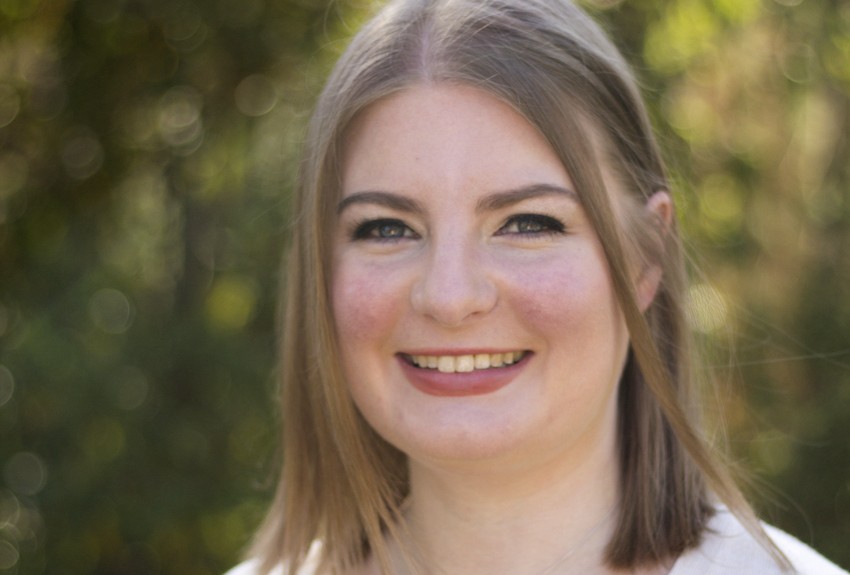 Image of the writer, Jessica Kaaden. Jessica has light brown, shoulder-length hair and a warm smile.