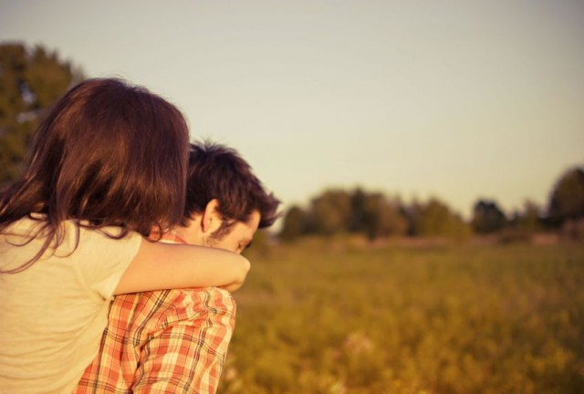 Couple walking in sunshine